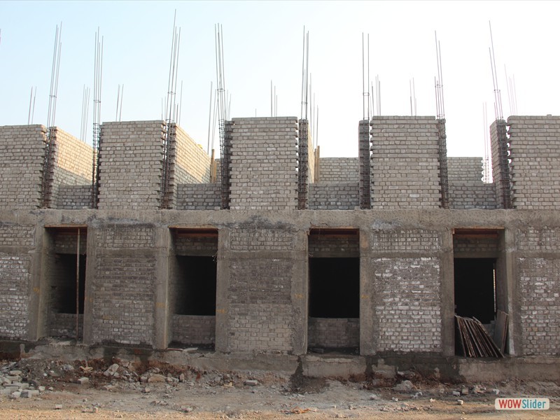Confined masonry construction designed for improved earthquake resistance at low cost